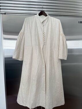 Minimalist Cream Button-Front Trench Coat from Ecole de Curosites